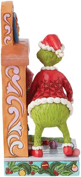 酷牌库|商品详情-Enesco进口代理批发 Enesco Dr. Seuss Grinch by Jim Shore 圣诞老人 Grinch Pushing Tree Up Chimney 雕像，Grinchmas 树脂石手工制作收藏品圣诞雕像家居装饰雕塑雕像，7.4 英寸，多色