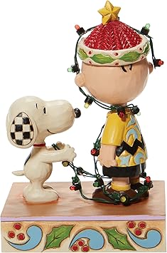 酷牌库|商品详情-Enesco进口代理批发 Jim Shore Charlie Brown 的《Enesco Peanuts》《魔发奇缘》灯光雕像，5.875 英寸，多色