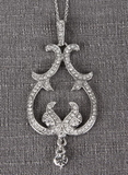 Ivy Lane Design Crystal Scroll Pendant Necklace