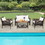 Costway 63958042 4 Pieces Patio Rattan Acacia Wood Furniture Set with Cushions and Armrest