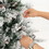Costway 82341659 7 Feet Flocked Christmas Tree with Pine Needles