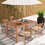 Costway 85649217 Patio Acacia Wood Dining Table with Umbrella Hole and Metal Legs