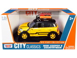 Motormax 79752  Mini Cooper S Countryman with Roof Rack and Accessories Yellow Metallic and Black 