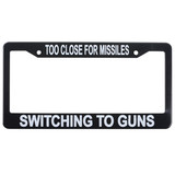 EDMO FRAME-1 License Plate Frame/Too Close For Missiles Switching To Guns. Plastic
