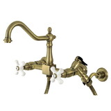 Kingston Brass KS1243PXBS Heritage Wall Mount Bridge Kitchen Faucet with Brass Spray, Antique Brass