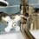 Kingston Brass KS267PXAB Kingston Deck Mount Clawfoot Tub Faucet with Hand Shower, Antique Brass