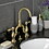 Kingston Brass KS7997BAL Heirloom Bridge Bathroom Faucet with Brass Pop-Up, Brushed Brass