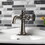 Kingston Brass KSD354CGVN Fuller Single-Handle Bathroom Faucet with Push Pop-Up, Black Stainless