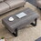 A rustic gray wood grain MDF coffee table with black metal legs - an elegant space in natural wood tones W1151132017