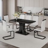 A minimalist dining table with six chairs. Black imitation marble desktop with MDF legs.6 dining chairs with white PU backrest cushions and black metal legs.Table size 63 