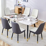 Modern minimalist dining table. Imitation marble patterned stone burning tabletop with black metal legs.Modern dining chair with PU artificial leather backrest cushion and black metal legs