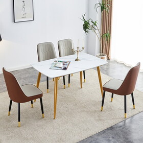 Table and chair set.A morden table with White imitation marble patterned stone burning tabletop with golden metal legs.Paried with 4 chairs with PU leather backrest and black metal legs.