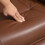 Faux Leather Manual Recliner, Adjustable Swivel Lounge Chair with Footrest, Armrest and Wrapped Wood Base for Living Room, Brown W2225P155584