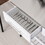 HOMCOM Kitchen Island with Stainless Steel Top, Open Shelves, and Drawers, Gray W2225P173899