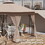 Outsunny 10' x 11.5' Metal Patio Gazebo, Double Roof Outdoor Gazebo Canopy Shelter with Tree Motifs Corner Frame and Netting, for Garden, Lawn, Backyard, and Deck, Brown