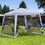 Outsunny 10'x10' Outdoor Canopy Tent, Slant Leg Sun Shelter with Mesh Sidewalls, Patio Tents for Parties, Grey W2225P200894