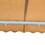 ALEKO AW10X8BEIGE29-AP Retractable White Frame Patio Awning 10 x 8 Feet - Light Beige