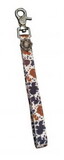 Showman 177996 Premium nylon Cow print Key Chain with floral concho
