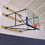 Jaypro S1012GB Basketball Backstop - Wall-Mounted - Shooting Station - Side Folding - Stationary Glass Backboard (10' - 12' Wall Offset), Price/Each