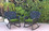 Jeco W00214-R_2-FS034 Set of 2 Windsor Black Resin Wicker Rocker Chair with Hunter Green Cushions