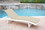 Jeco White Wicker Adjustable Chaise Lounger with Ivory Cushion