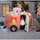 Gemmy Industiries SS37289G 66" Blow Up Inflatable Animated Gingerbread Trailer with Santa Outdoor Yard Decoration