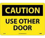 NMC C630 Caution Use Other Door Sign