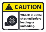 NMC CGA44 Caution, Wheels Must Be Chocked Before Loading Or. . .