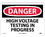 NMC 10" X 14" Vinyl Safety Identification Sign, High Voltage Testing In Prog.., Price/each