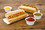 Packnwood 210CDOG Newspaper Printed Hotdog Tray - 7 in., 1000 pcs/ Case, Price/Case