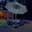 Island Umbrella NU5424R Mirage Fiesta 9-ft Octagonal Market Umbrella with Solar LED Lights - Red / Olefin